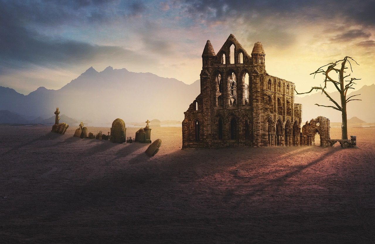 A castle with a sky background and mountains in the distance