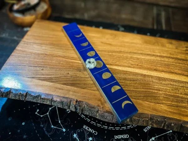 A wooden board with a blue strip on top of it