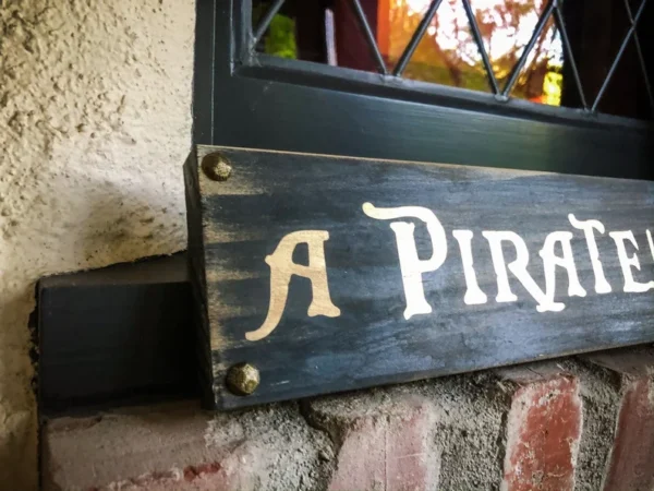 A sign that says " a pirate ".