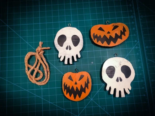 Halloween ornaments: skulls and pumpkins.