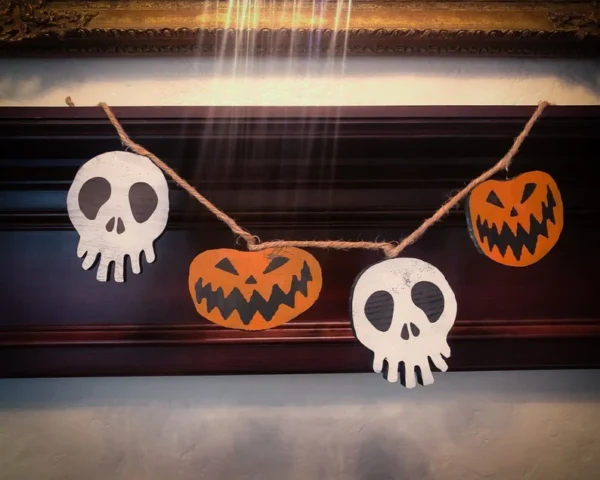 Halloween garland: skulls and pumpkins.