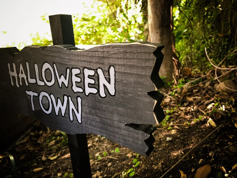 Halloween Town signpost in woods