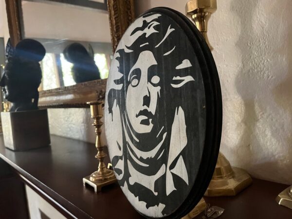 Black and white Medusa wood plaque.