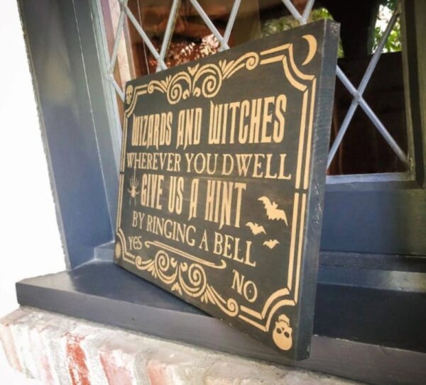 Halloween sign: Ring bell for a hint.