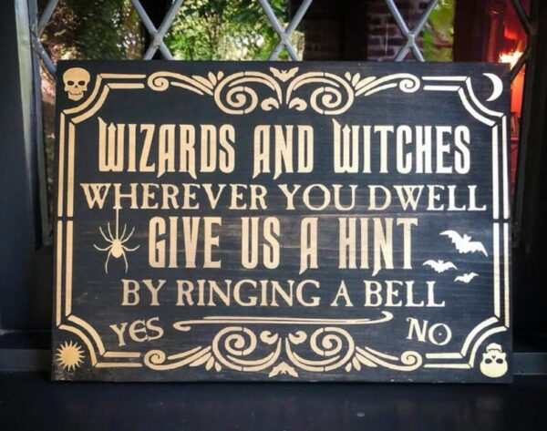 Halloween sign: ring bell for hint.