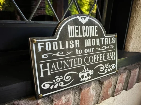 Haunted coffee bar welcome sign.