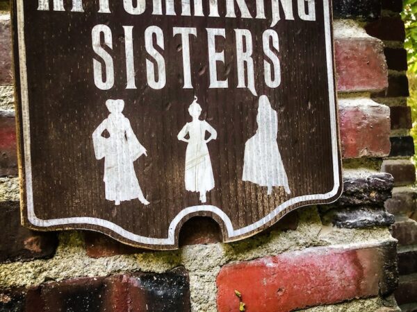 Whimsical Sisters Restroom Sign