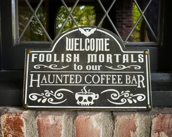 Haunted coffee bar welcome sign.