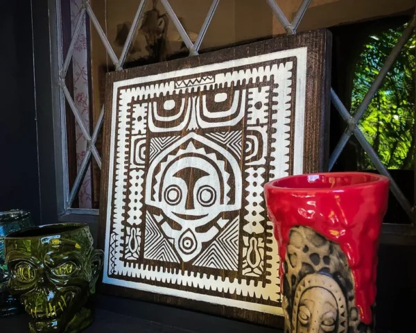 Wooden tiki mask wall art decor.