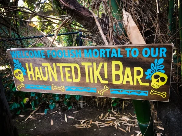 Haunted Tiki Bar sign welcome.