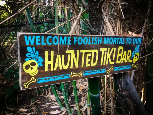 Haunted Tiki Bar sign welcomes you.