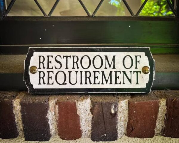 Restroom of Requirement sign.