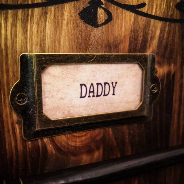 Wooden box labeled "Daddy".