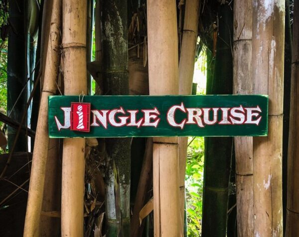 Jingle Cruise sign on bamboo.