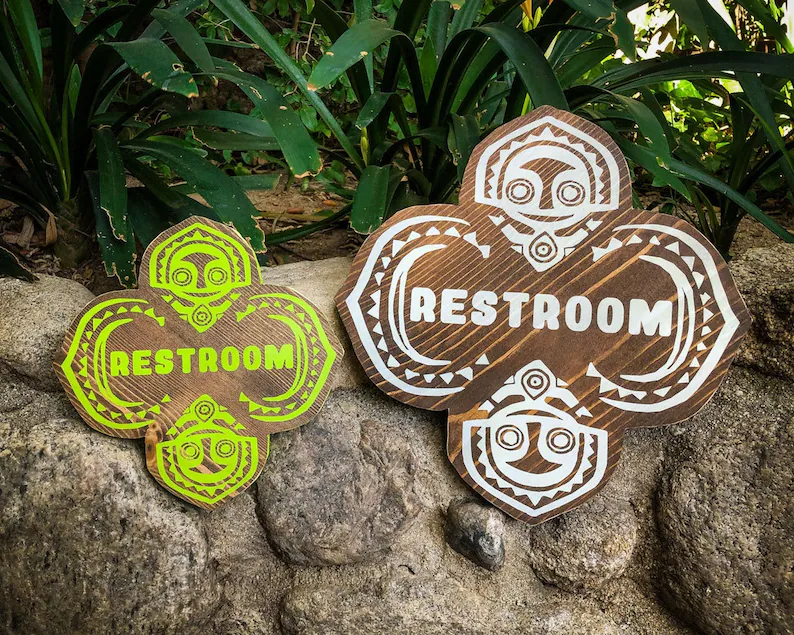 Restroom sign; Polynesian design.