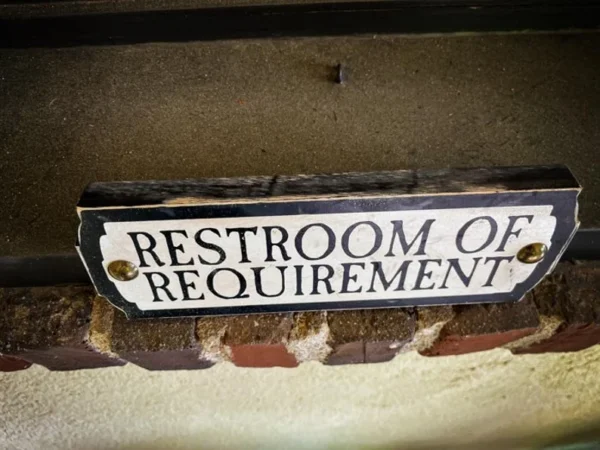 Restroom sign: Requirement only.