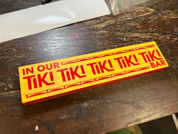 Yellow Tiki bar sign: In our Tiki bar