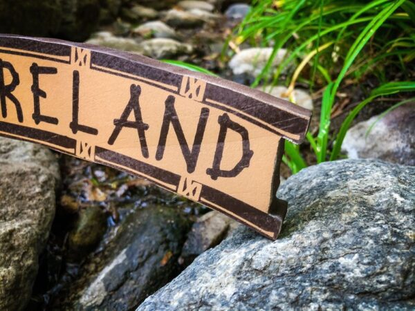 Ireland sign by a stream.