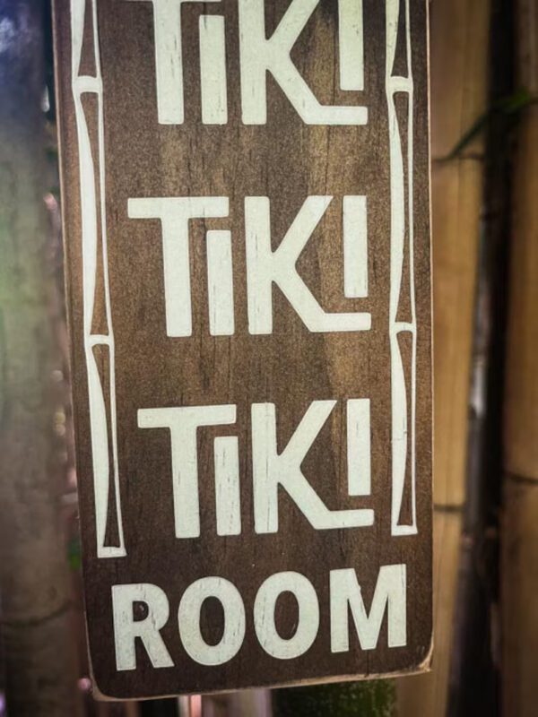 Tiki Room wooden sign.