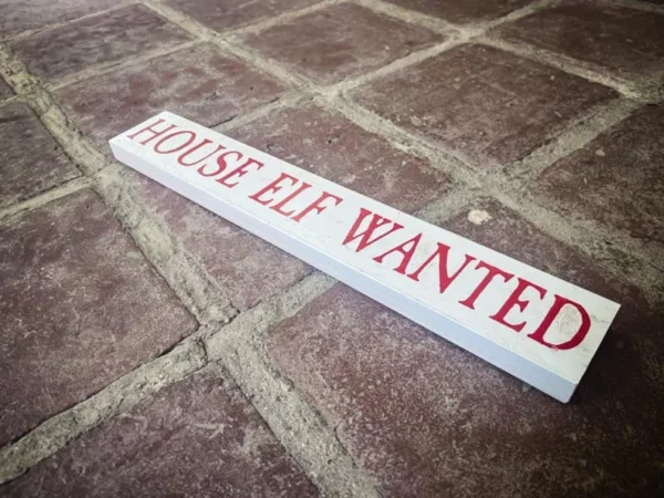 House elf wanted - sign on floor.