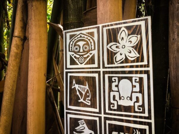 Wooden panel with Polynesian symbols.