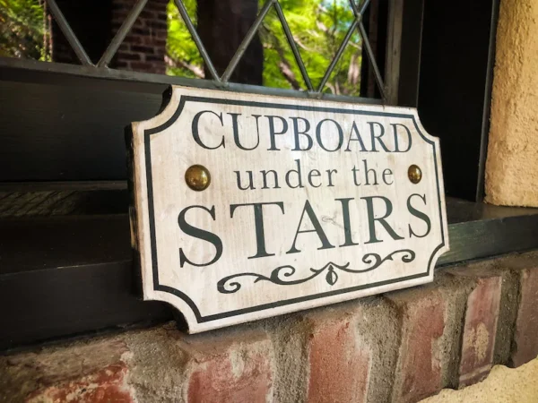 Cupboard under the stairs sign.