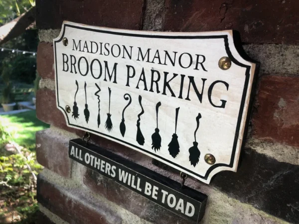 Madison Manor: Broom Parking Only.