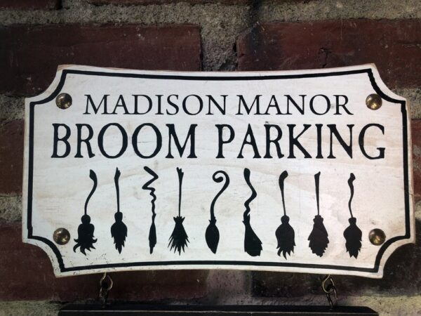 Madison Manor broom parking sign.