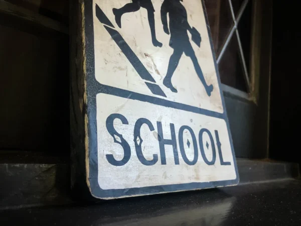 School crossing sign, children walking.