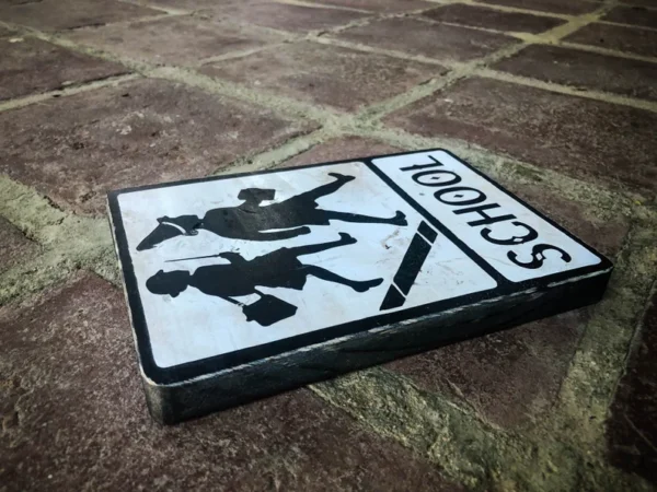 School crossing sign, children walking.