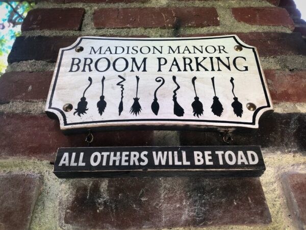 Madison Manor broom parking sign.