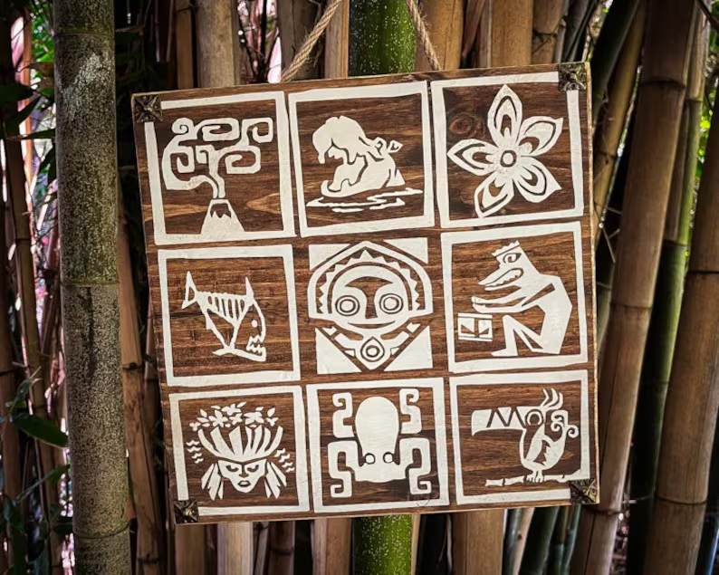 Wooden sign with Polynesian symbols.