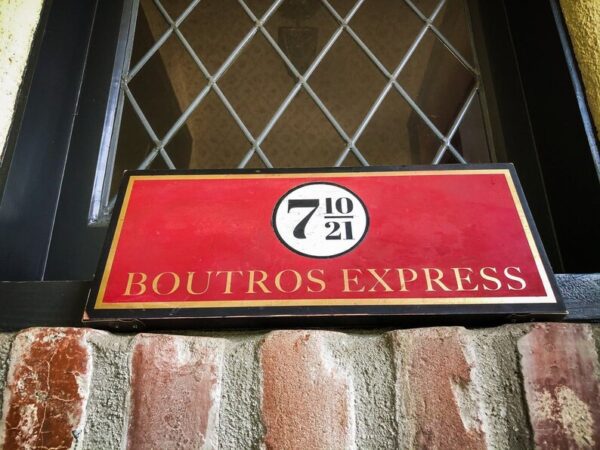 Red sign: Boutros Express 7 10/21