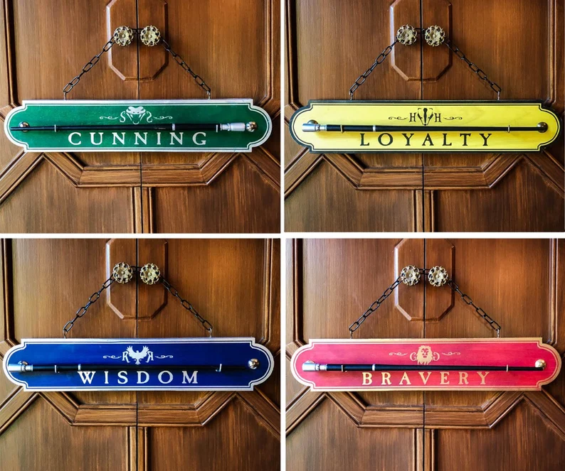 Four house signs: cunning, loyalty, wisdom, bravery.