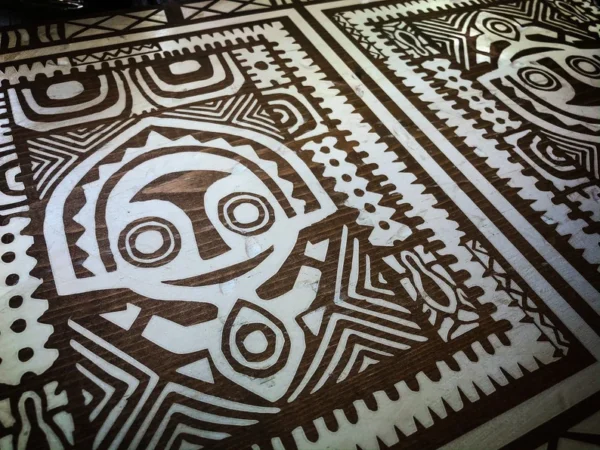 Wooden surface with tribal pattern.