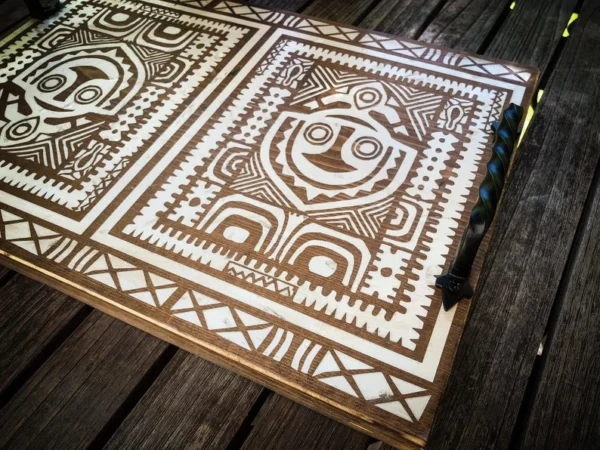 Wooden tray with tribal design.