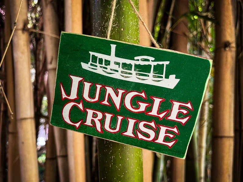 Jungle Cruise sign with boat image.