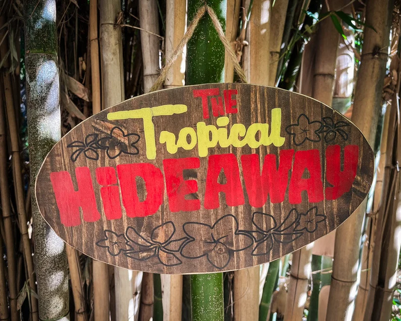 The Tropical Hideaway wooden sign.