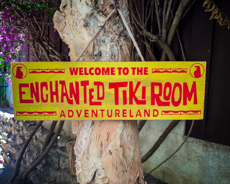 Enchanted Tiki Room, Adventureland sign.