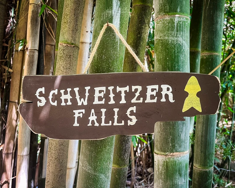 Schweitzer Falls sign, bamboo background.