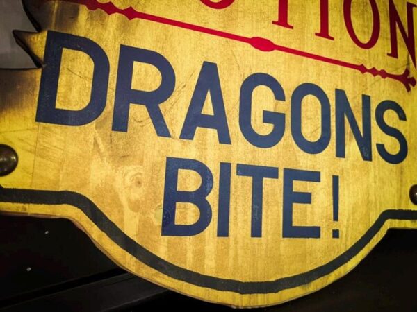 Dragons bite! Warning sign.