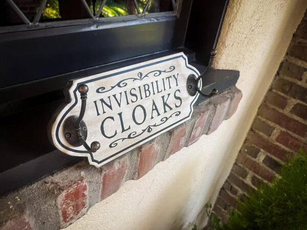 Invisibility cloaks hook sign.