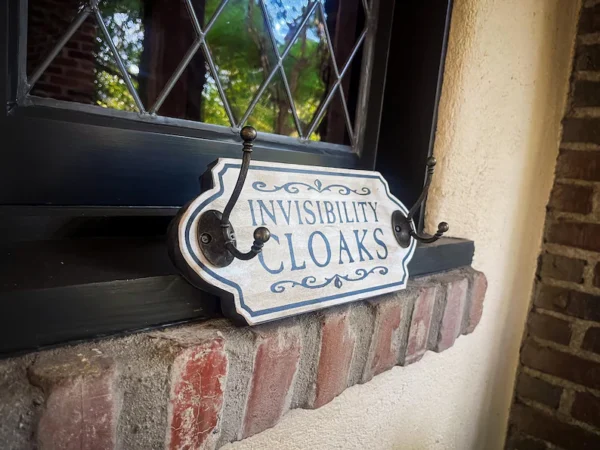 Invisibility cloaks hook sign.